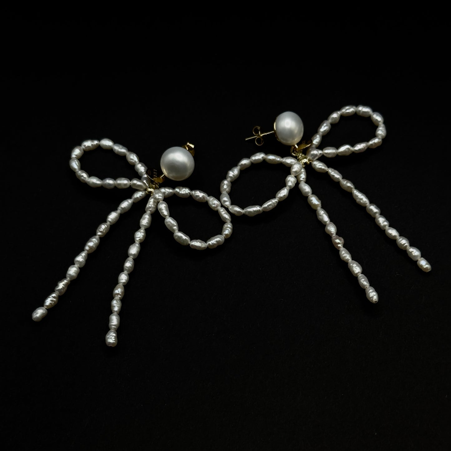 BIG BOW- Orecchini fiocco con perle
